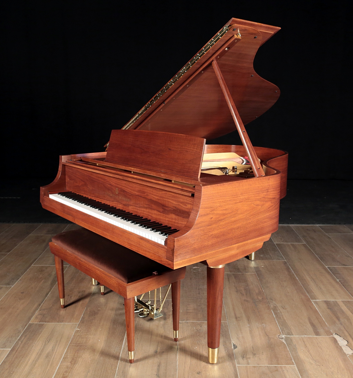 Natural walnut satin Steinway with gold hardware