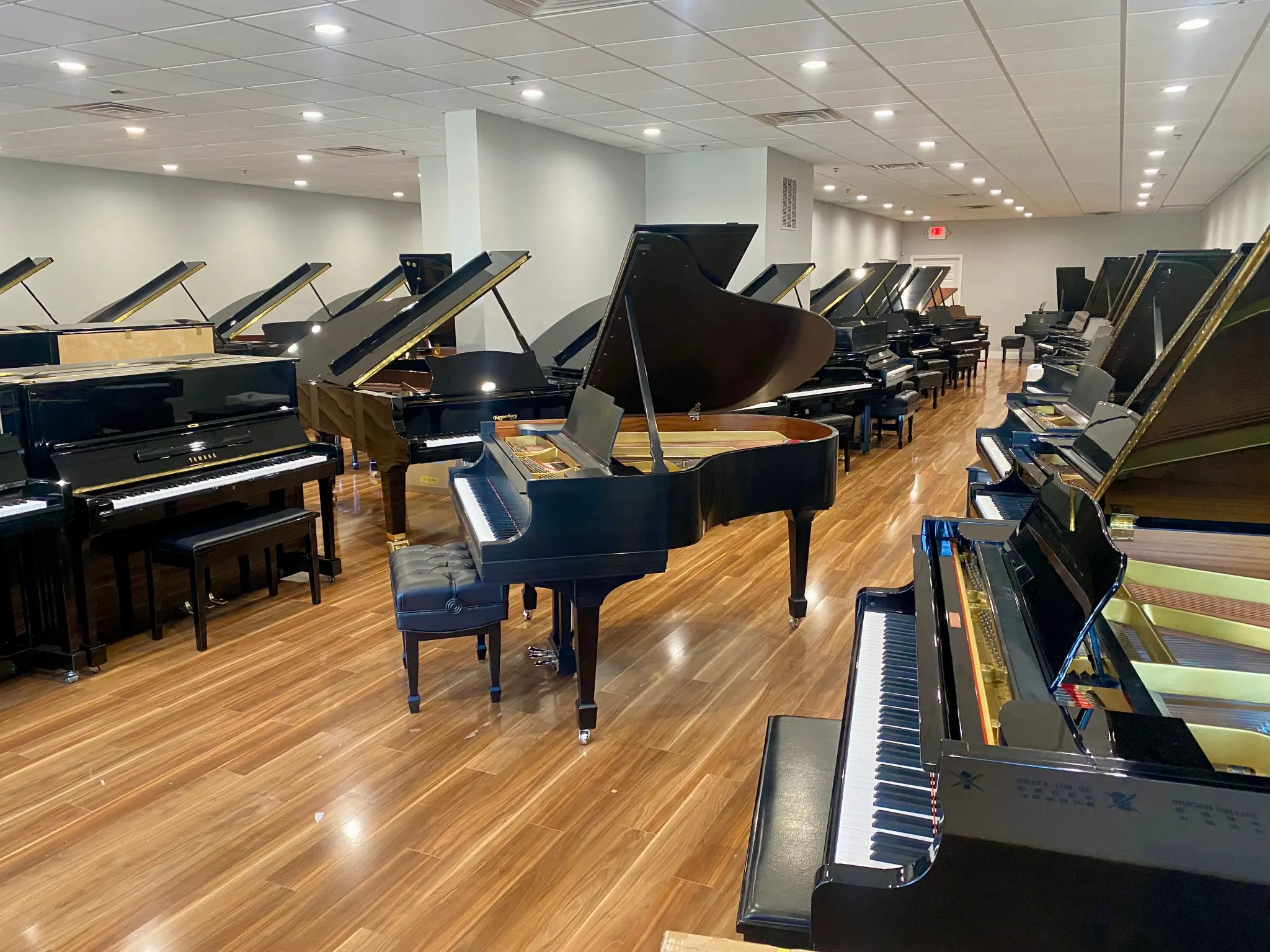 Lindeblad showroom floor with grand pianos