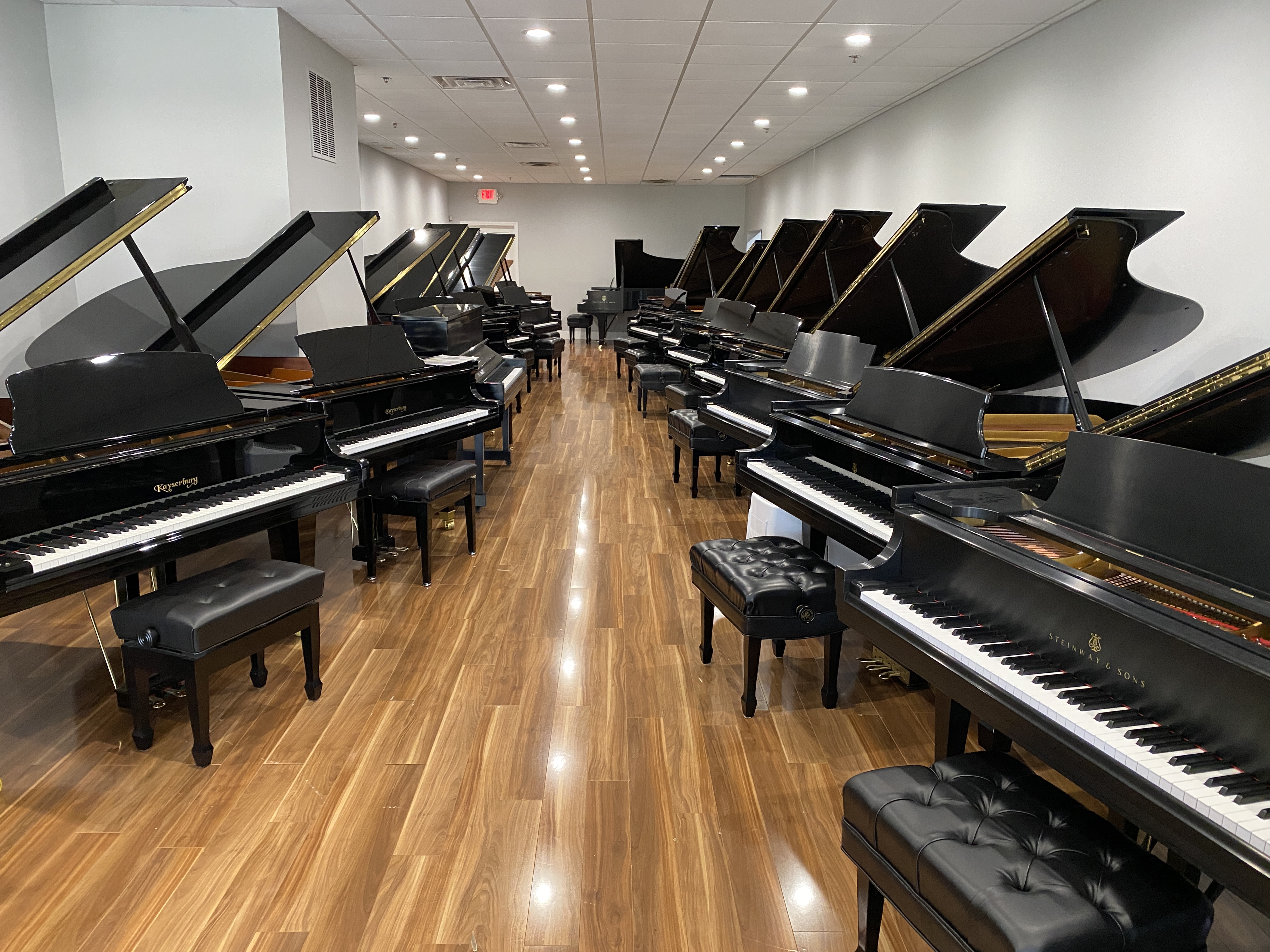 The Lindeblad showroom floor with restored Steinway grands
