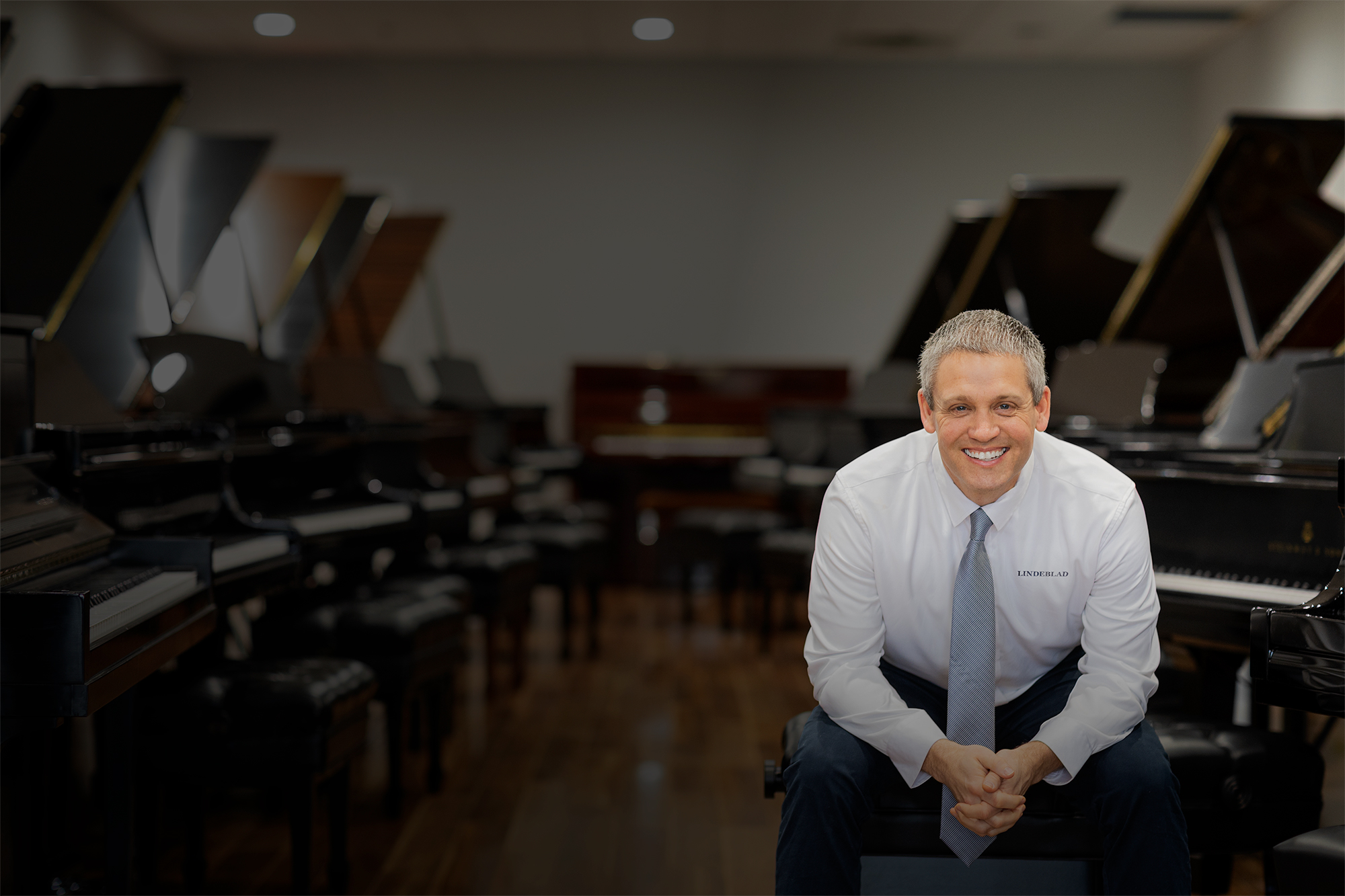 Todd Lindeblad in the Lindeblad piano showroom